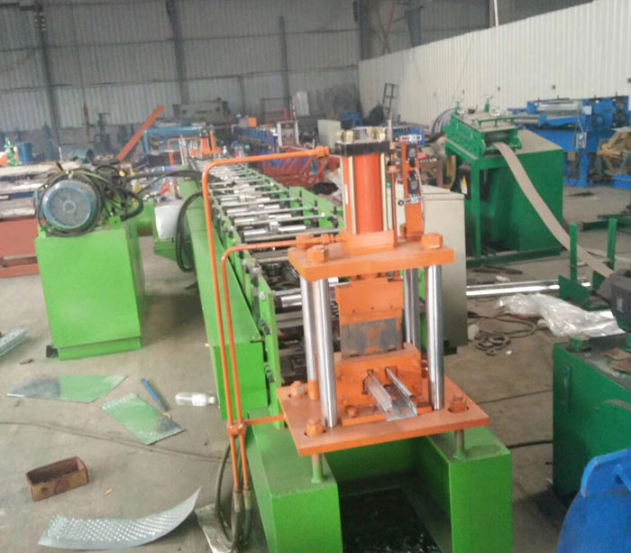 Shelf laminate roll forming machine